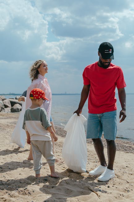 A person wearing a white T-shirt with the words 'NO PLANT B' printed in green, white gloves, and a black wristwatch is holding a clear plastic bag filled with crumpled paper or lightweight waste. The 